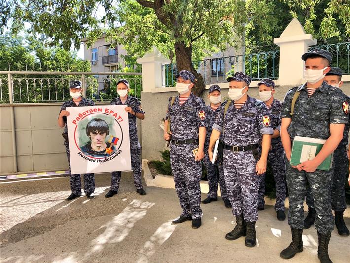 Акция памяти о Герое России Магомеде Нурбагандове проведена росгвардейцами в Севастополе (видео)